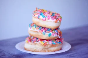 KRISPY KREME® and Fruity PEBBLES™ Unveil Limited-Time Milk Glaze Doughnuts